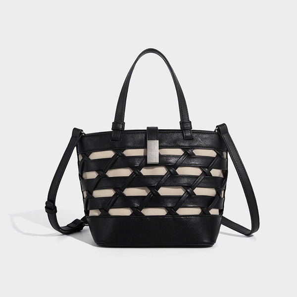 Structured woven lattice tote bag with cream lining, dual top handles, detachable crossbody strap, and silver-tone hardware