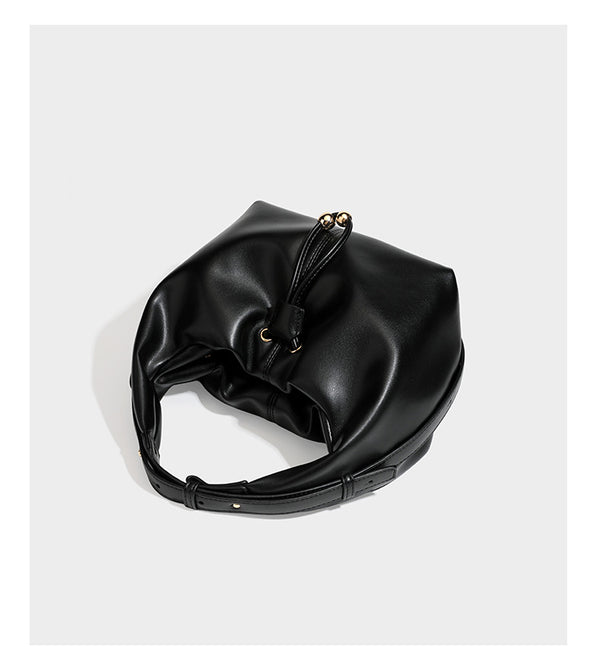 Slouchy hobo bag with smooth leather-look finish, drawstring cinch closure, and gold-tone bead hardware, detail view 11