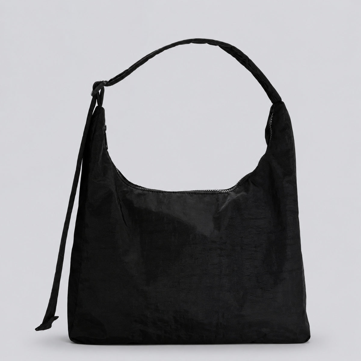Multicolor plaid and star print hobo shoulder bag with knotted strap and silver-tone zip closure, detail view 6