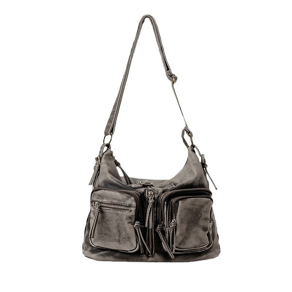 Distressed gunmetal gray hobo shoulder bag with multiple front zip pockets and adjustable crossbody strap, detail view 5