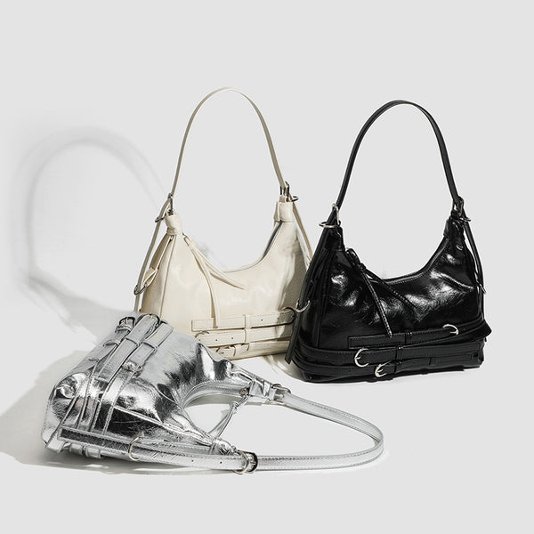Slouchy hobo shoulder bag in glossy crinkled leather-look finish with silver-tone buckle hardware and slim adjustable strap