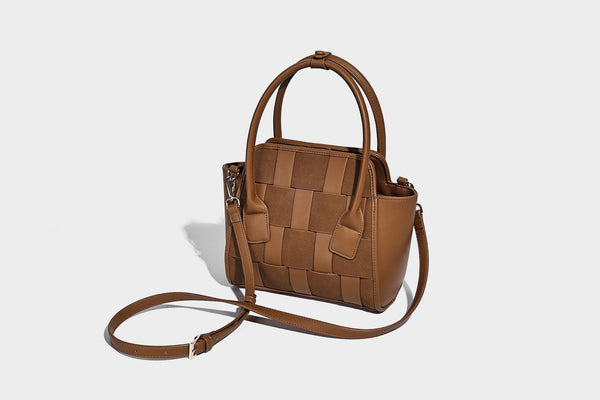 Small structured woven-panel mini tote bag with double top handles and detachable crossbody strap in matte leather-look