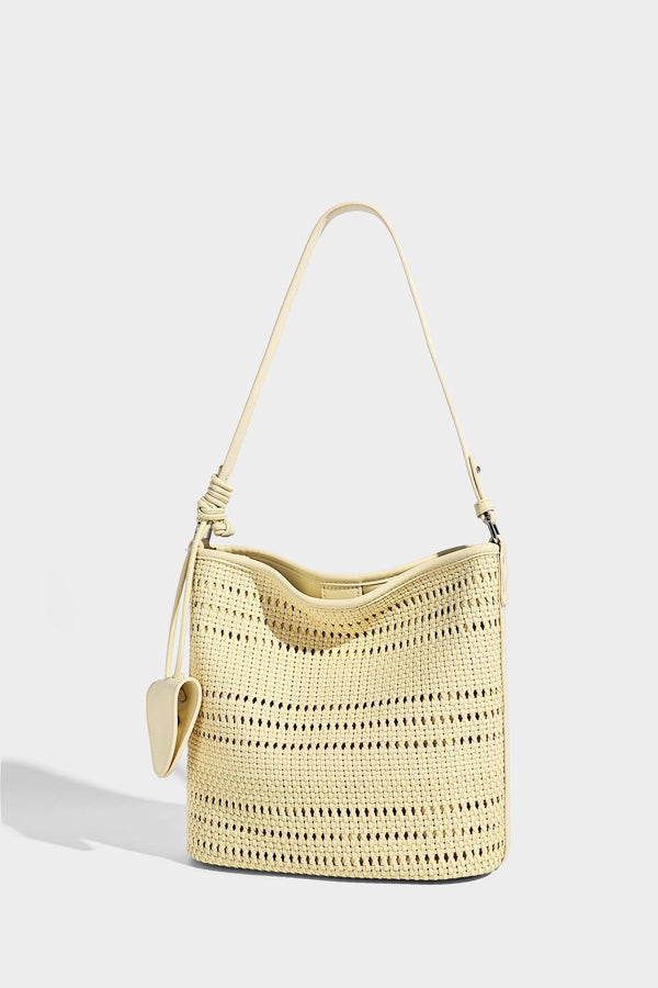 Handwoven open-weave shoulder bag with leather-look trim, knotted adjustable strap, and clip-on sunglasses sleeve pouch