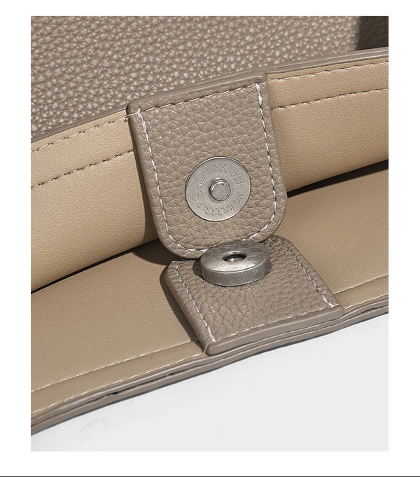 Structured pebbled leather-look tote bag in taupe with long shoulder strap, detachable zip pouch, and pink tulip flower