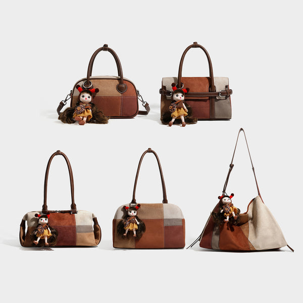 Boxy patchwork suede-look shoulder tote in tan, beige, rust, and brown panels with double brown straps and hanging doll