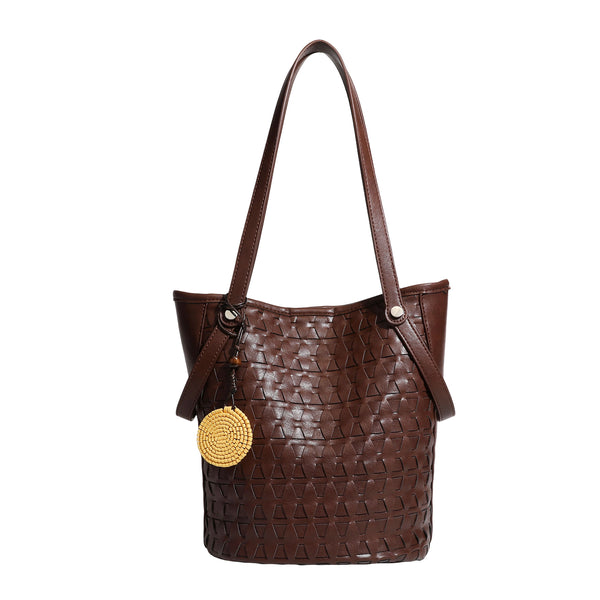 Brown embossed geometric woven leather-look bucket tote bag with dual shoulder straps, side snap hardware, and a round