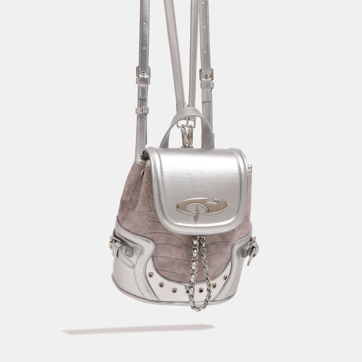 Croc-embossed mini backpack with silver metallic leather-look trim, decorative chain, and metal logo clasp, front view