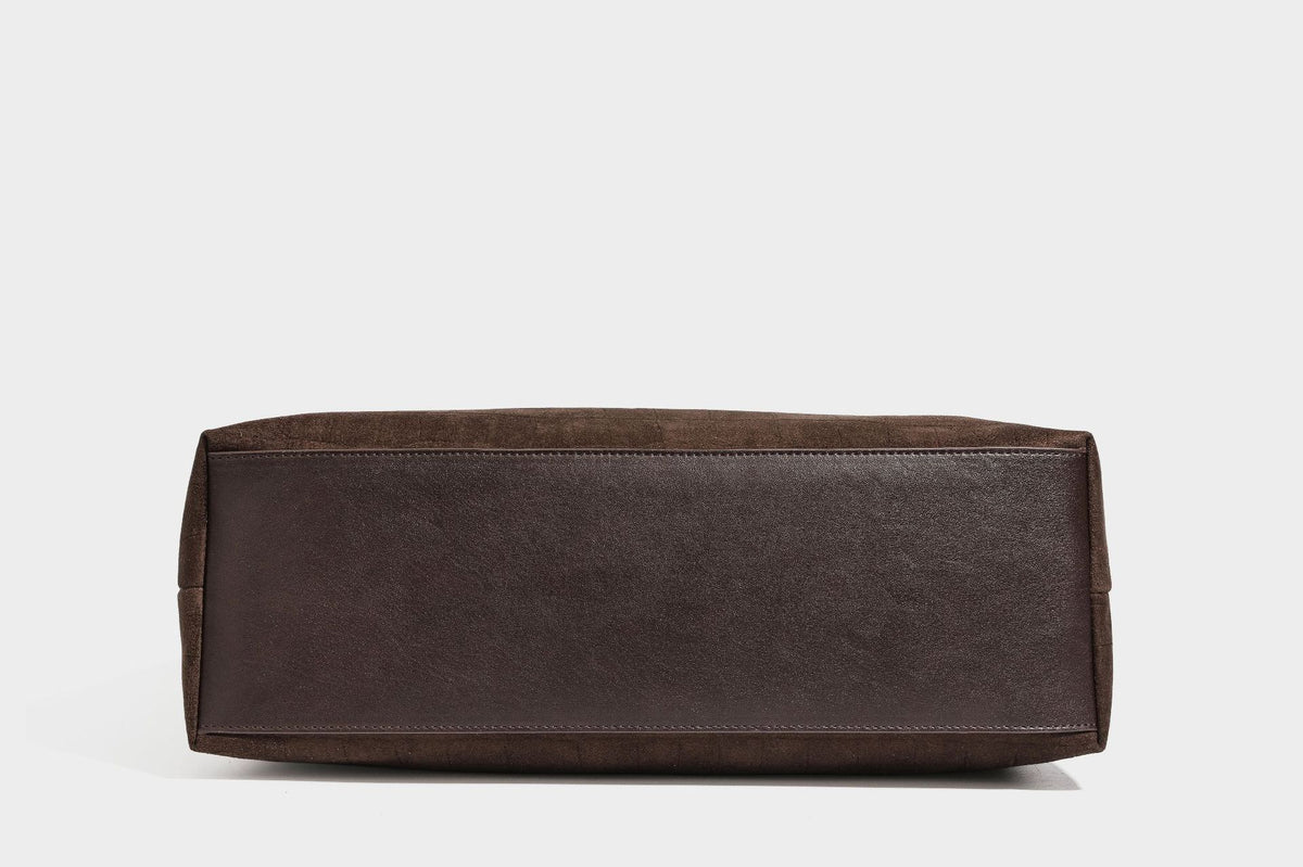 Slouchy hobo shoulder bag in matte croc-embossed leather-look finish with top zip closure and long adjustable strap, detail