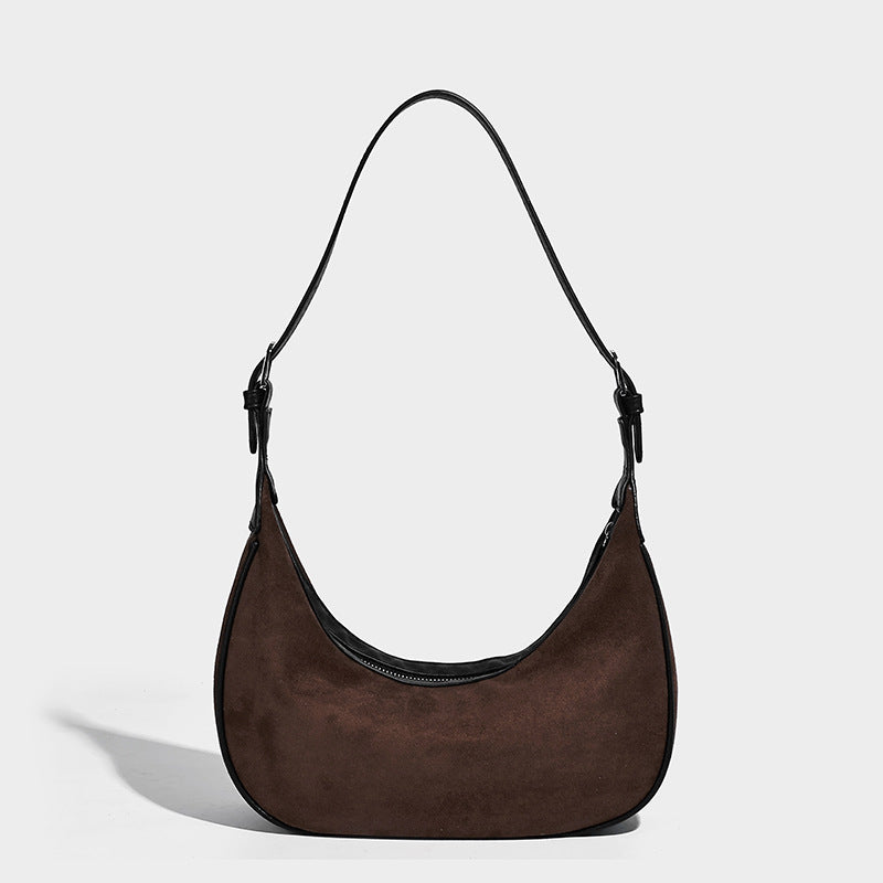 Crescent hobo shoulder bag in matte suede-look finish with black trim and adjustable strap, detail view 7