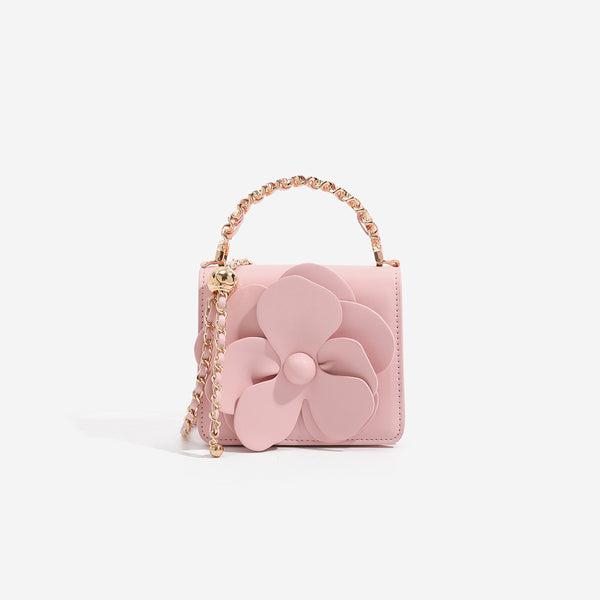 Small structured rectangular crossbody bag with layered 3D flower appliqué and gold-tone chain strap, detail view 6