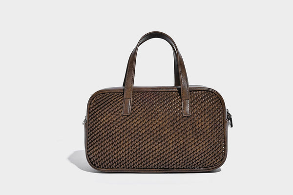 Structured woven-texture front top-handle handbag with zip closure, dual handles, detachable shoulder strap, and matching