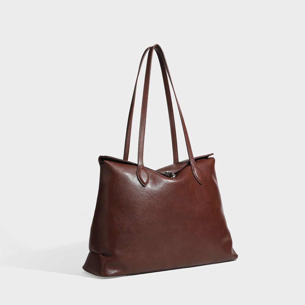 Large leather-look tote shoulder bag with slim double straps and silver-tone turn-lock closure, front view
