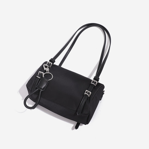 Compact nylon Boston barrel bag with zip-top closure, silver-tone hardware, dual slim handles, and detachable crossbody