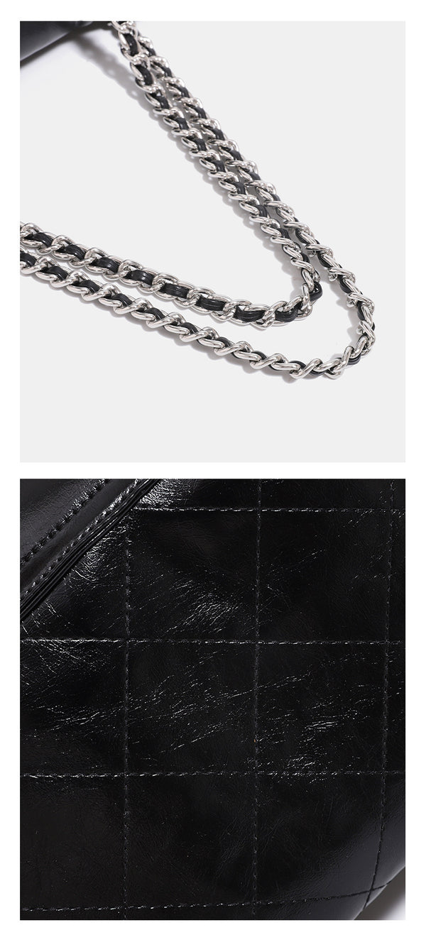 Quilted trapezoid shoulder bag with chain straps, flap closure, and ring hardware, detail view 15