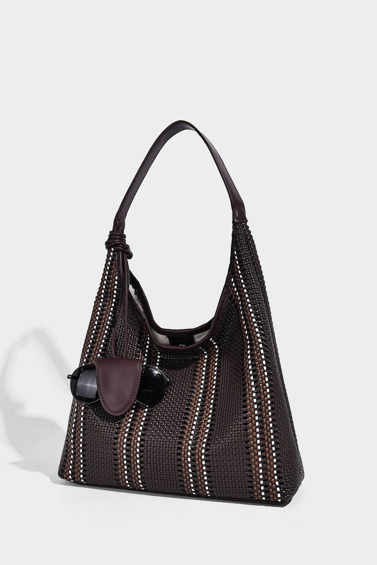 Woven striped slouch shoulder tote bag with knotted strap and attached front flap pouch, detail view 20