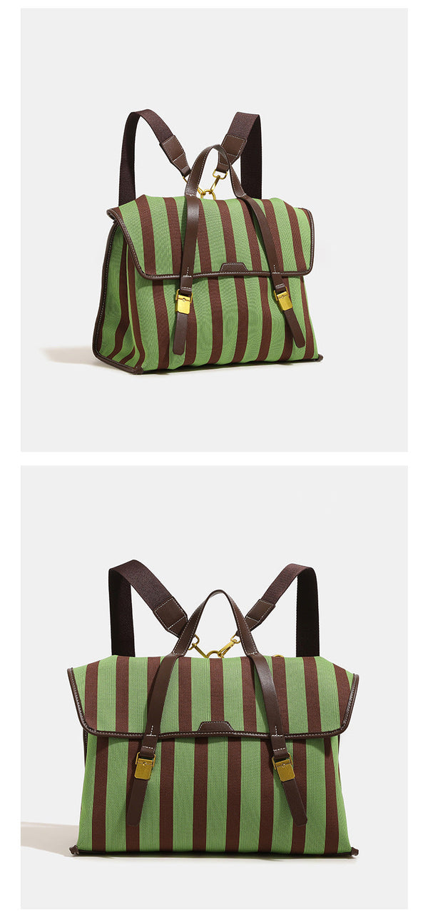 Structured striped canvas convertible satchel bag with leather-look trim, gold-tone buckle hardware, and backpack straps