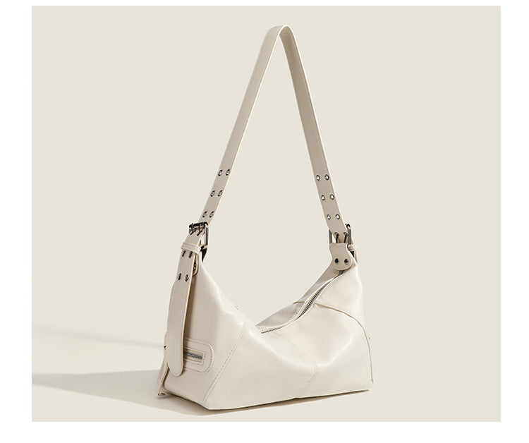 Glossy crinkled mini hobo shoulder bag with studded adjustable strap and silver-tone hardware, detail view 21