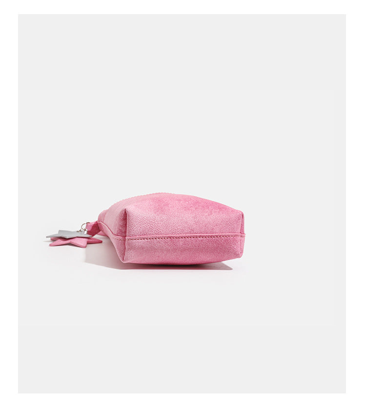 Small vertical textured mini crossbody phone bag with long braided cord strap and silver-toned star charm, detail view 14
